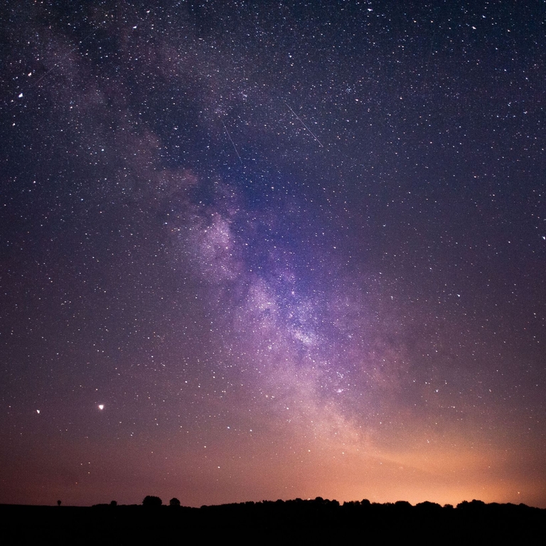Stars and the Milky Way clearly visible in the night sky above Exmoor