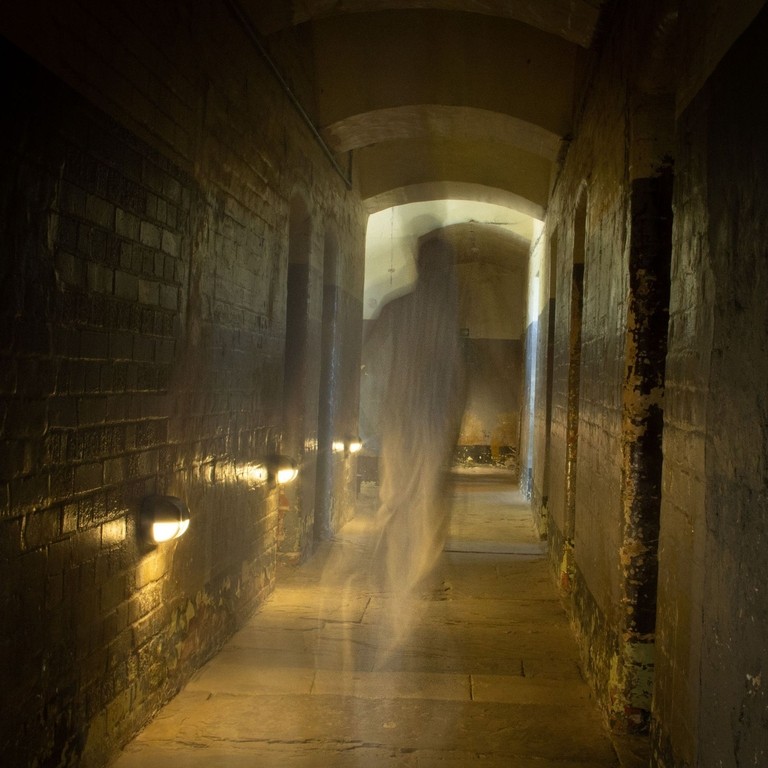 Ghost walking along a prison corridor (Promo shot for Paranormal experience)