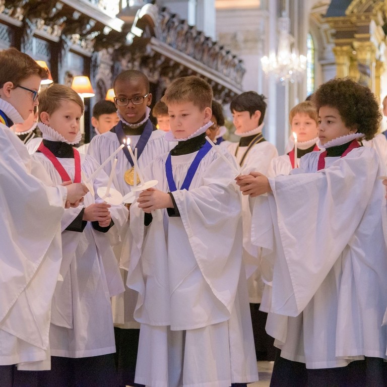 St Paul's Choristers lighting candles at Christmas