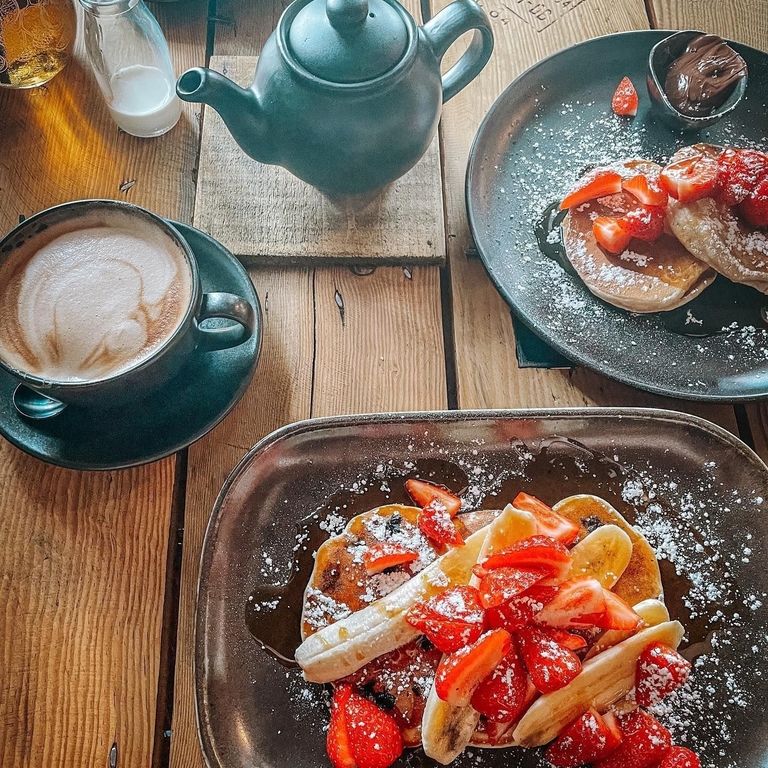 Plates of food on a table at the Green Shed Cafe