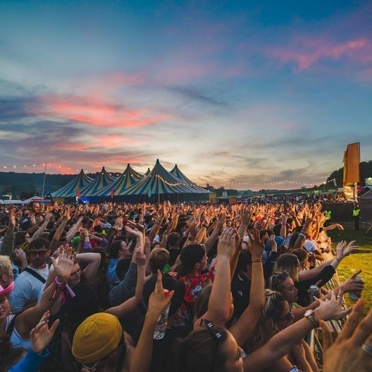 Boundary Festival at night with crowds enjoying the performance on stage