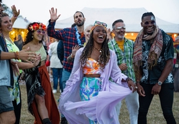 A group of friends having fun at a festival.
