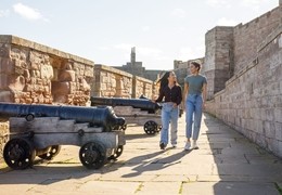 Friends explore Bamburgh castle