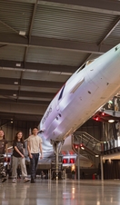A family explore an Aerospace museum
