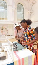 A family looking at an exhibit in York Art Gallery