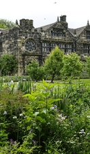 An English manor house and formal gardens