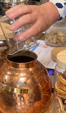 A drink being prepared at Goosnargh Gin School in Lancashire