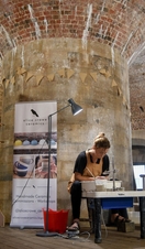 A ceramics artist at work in a studio