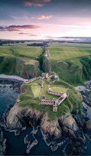 Aerial view of Dunnottar Castle looking inland from the sea