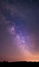 Stars and the Milky Way clearly visible in the night sky above Exmoor