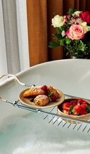 Food placed above a bath in a hotel room in Manchester's King Street Townhouse