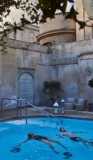 Women swimming in a swimming pool at a spa