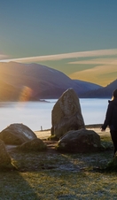 People attending the Winter Solstice celebration at Castelrigg Stone Circle near Keswick in Cumbria
