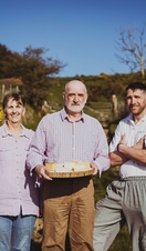 Farmers posing with fresh farmhouse cheese at Pant Mawr Farmhouse