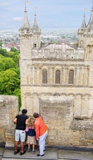 Aerial view of people looking down from a tower at Exeter Cathedral