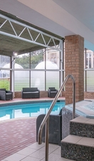 A pool and hot tub inside Kenwood Spa in Sheffield