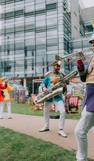 A band playing in the outside square of Manchester's Media City