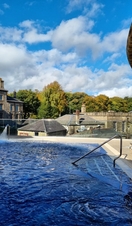 Outdoor view of Buxton Crescent &amp; Thermal Spa with buildings in the background
