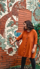 Standing infront of a mural