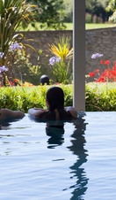Two people relaxing in a spa pool in Cornwall