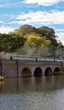 A train crosses a bridge as part of the Great Central Railway