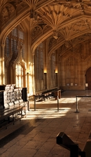 An old hall with grand ornate walls in the Divinity School, part of Oxford's Bodleian Library