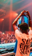 A DJ performing on stage at SWG3 Stage Warehouse in Glasgow