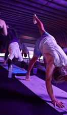 A yoga class being undertaken at Hotpod Yoga in Glasgow