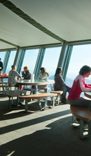 Walkers dining in Hafod Eyrie café situated high on a mountain in Snowdonia/Eryri National Park, Wales