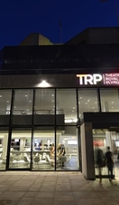 An outdoor nighttime view of the Theatre Royal Plymouth