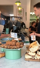 Cakes and pastries on sale at a café in Bristol