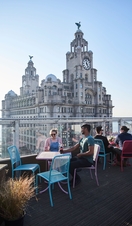 Rooftop terrace restaurant with expansive city views