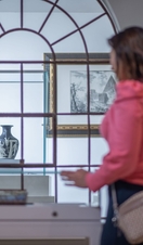 A woman and a man tour a museum