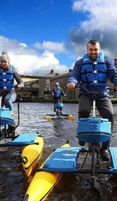 People on hydrobikes on the river Erne, Enniskillen