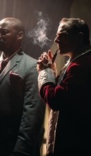 Two actors mid-performance of the Great Murder Mystery at The Lost Estate in London