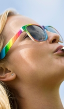 Young Woman Blowing Whistle On Gay Pride Parade