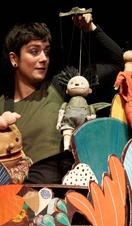 A performer on stage at Norwich Puppet Theatre