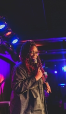 A performer on stage at Brighton's Komedia, a comedy club