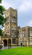 Family walking around the grounds of Cliffe Castle Museum, Bradford.
