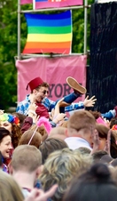 A crowd watching a performance on stage at York Pride