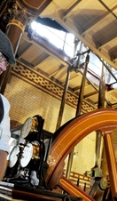 A man demonstrating machinery at Abbey Pumping Station in Leicester