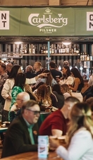 Visitors in the bar at Common Market, Belfast