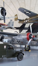 An array of military vehicles on display at the American Air Museum in Duxford