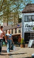 A couple walking through a courtyard