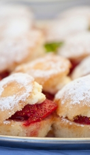 Scones with strawberry jam for a traditional English tea.
