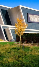 Exterior shot of a live events venue with a modern architectural style. 