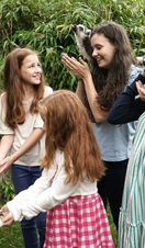 Visitors feeding lemurs at Colchester Zoo
