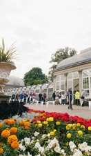 Groups of people exploring the art installations in Sheffield Botanical Gardens
