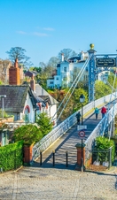 View of residential houses alongside river Dee in Chester, England.