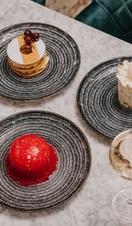 Plates of food being served on a table at Fourth Floor Bar in Harvey Nichols Leeds